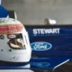 Michael Schumacher assina capacete com outros campeões de F1