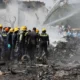 As devastadoras imagens do avião que caiu com 242 pessoas na índia